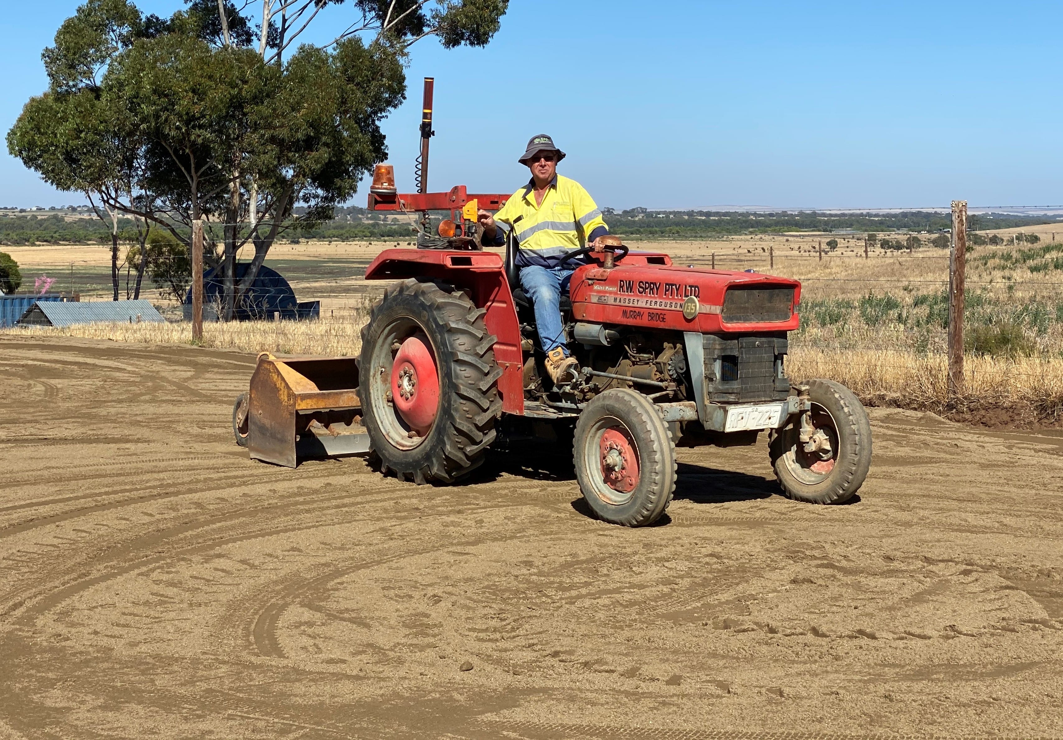Massey Fergason Tractor with Laser Plane Attachment